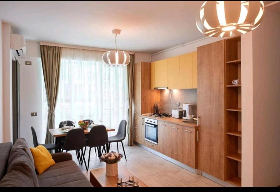 Kitchen or kitchenette, Living room, Seating area, Dining area