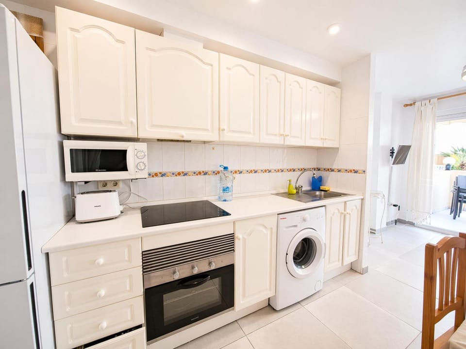 Kitchen or kitchenette, stove, kitchen