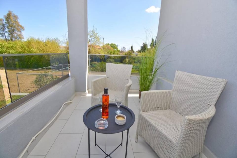 Potamos Deluxe White Apartment Apartment in Corfu, Greece