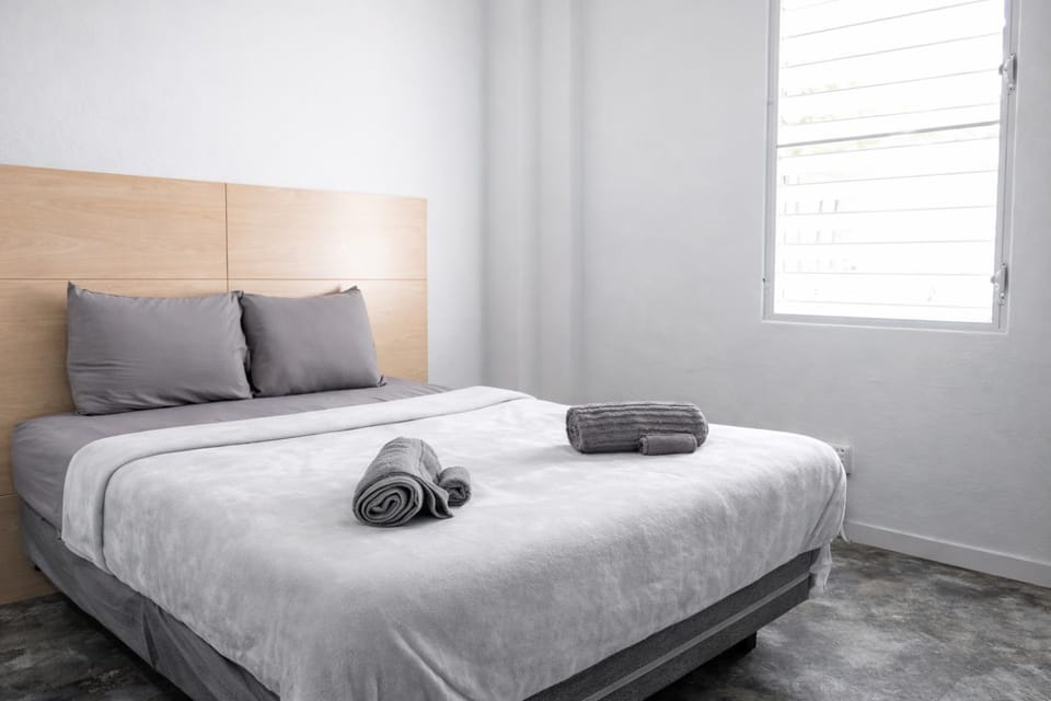 Bed, Photo of the whole room, Bedroom, towels, air conditioner