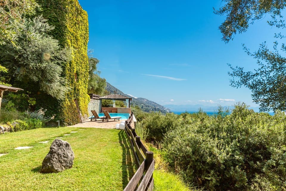 Patio, Natural landscape, BBQ facilities, View (from property/room), Other, Decorative detail, Seating area, Text overlay, Mountain view, Pool view, Sea view, Swimming pool, Swimming pool, Certificate/Award, Family
