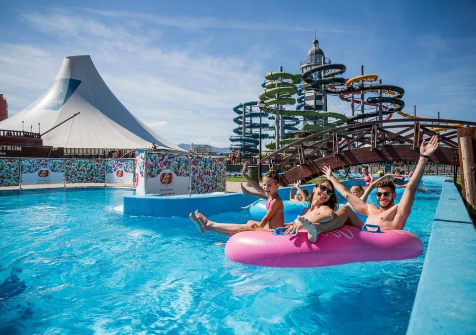 People, Natural landscape, Aqua park, Pool view, Swimming pool, group of guests, sunbed