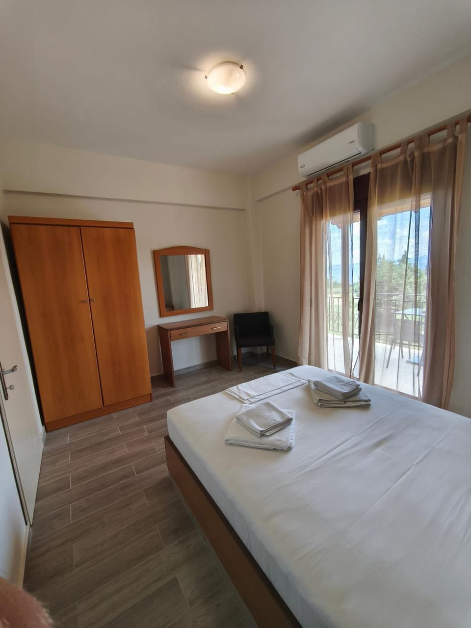 Bed, Bedroom, towels, wardrobe, air conditioner