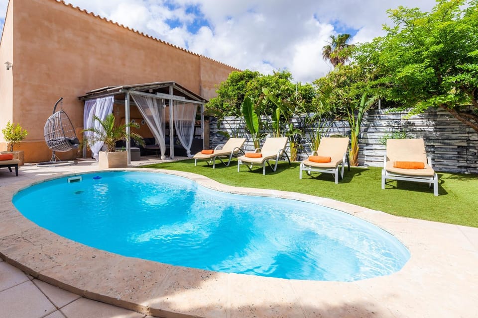 Property building, Living room, Swimming pool