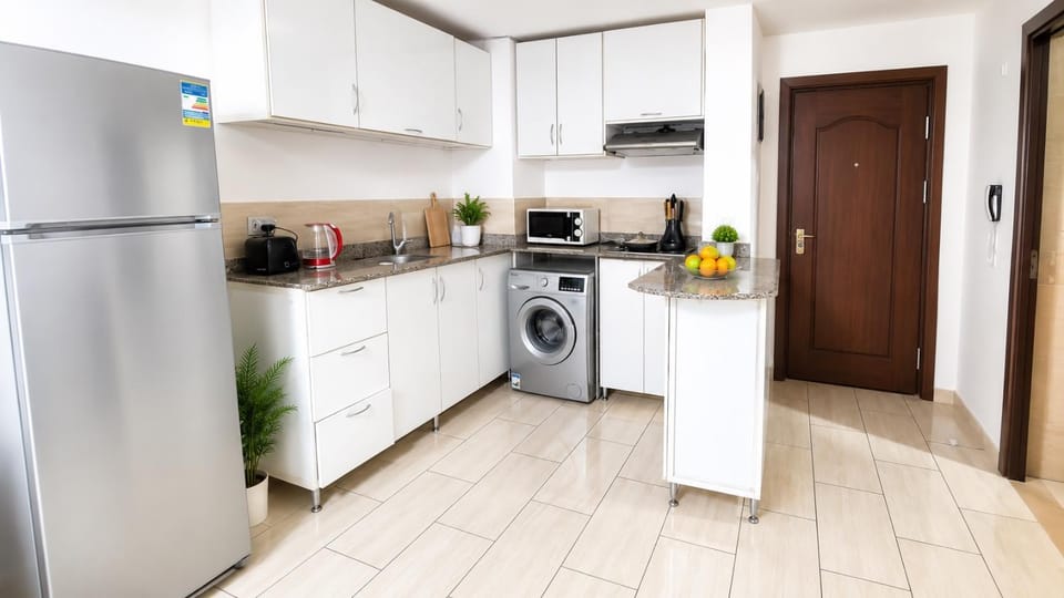 Coffee/tea facilities, Kitchen or kitchenette, oven, stove, toaster, washing machine