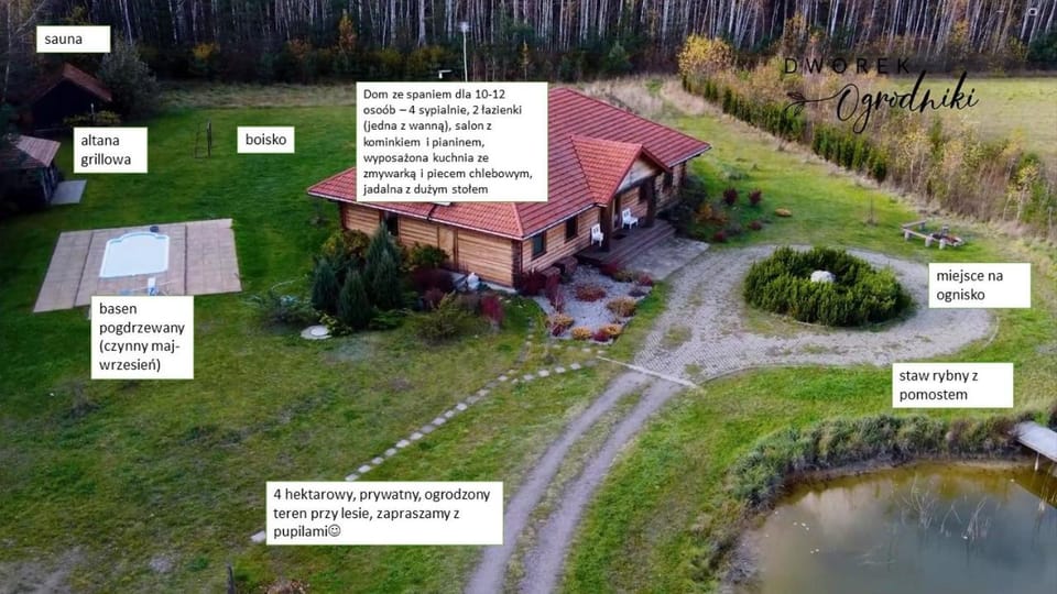 Dworek Ogrodniki, całoroczny dom na wyłączność, basen, sauna, las, staw rybny, altana grillowa, ognisko, pianino, kominek, piec chlebowy, duża ogrodzona posesja Chalet in Belarus