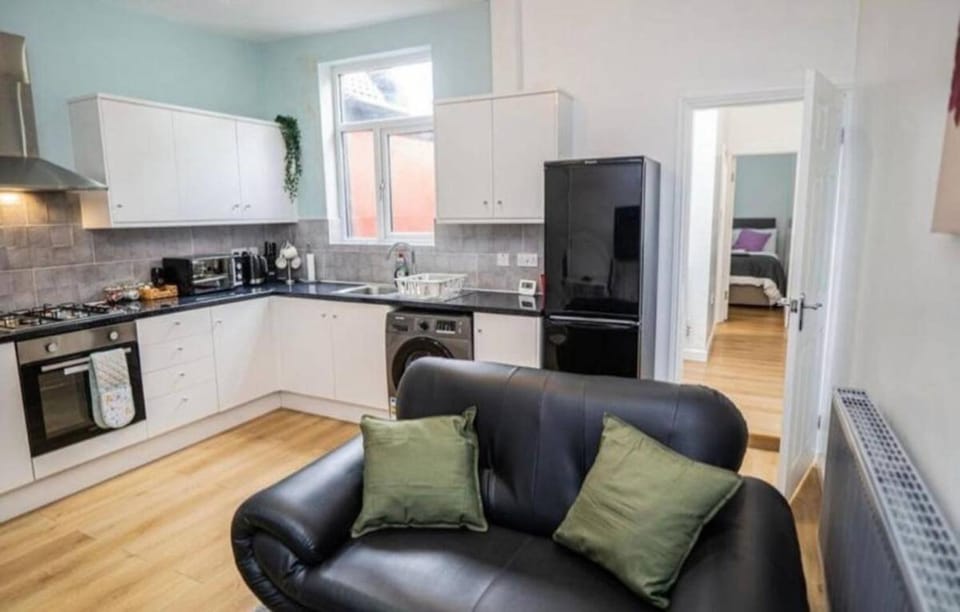 Kitchen or kitchenette, Living room, Seating area, oven, stove