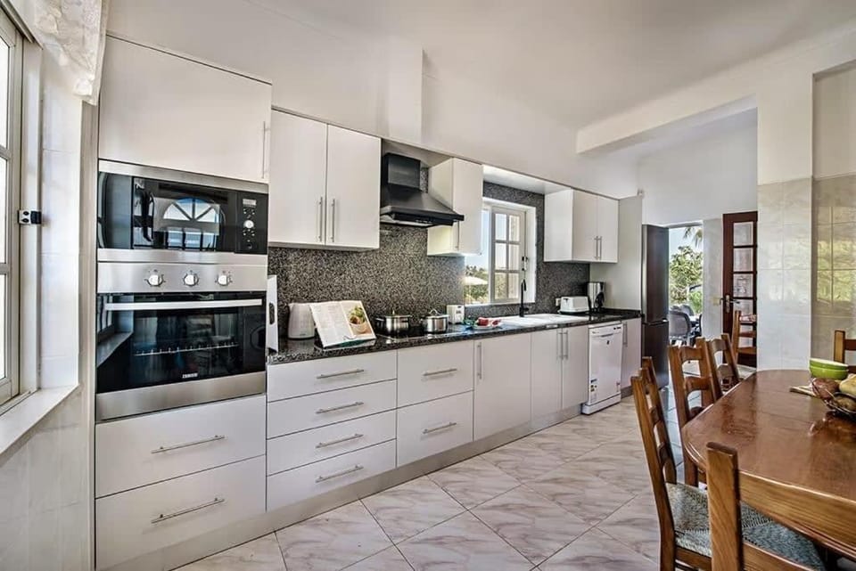 Kitchen or kitchenette, Dining area, dishwasher, oven, stove, toaster