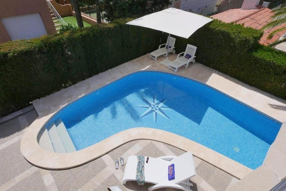 Property building, Living room, Swimming pool