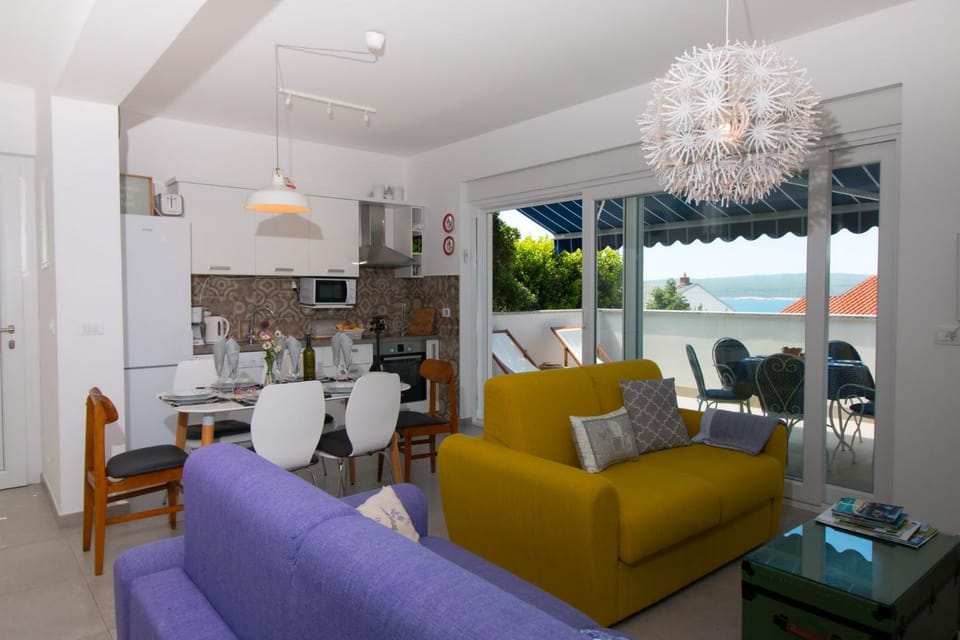 Kitchen or kitchenette, Living room, Dining area, Sea view