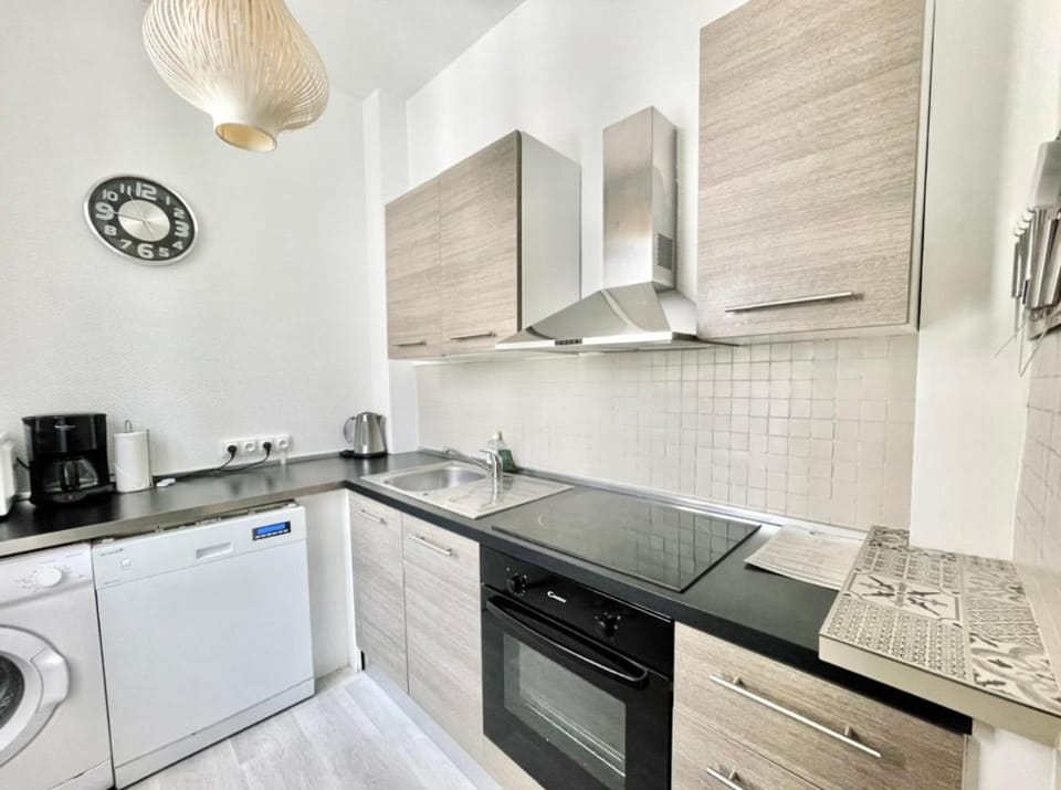 Kitchen or kitchenette, dishwasher, oven, stove, toaster