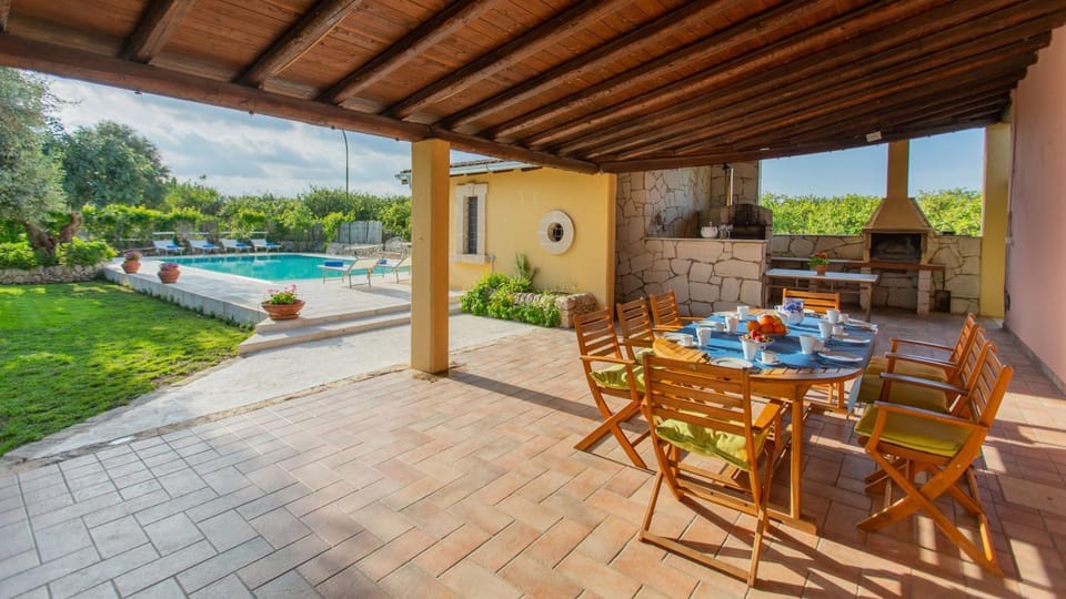 Patio, Dining area, Pool view