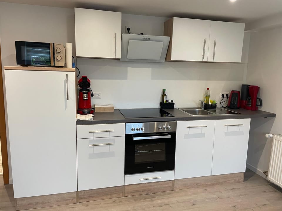 Kitchen or kitchenette, oven, stove