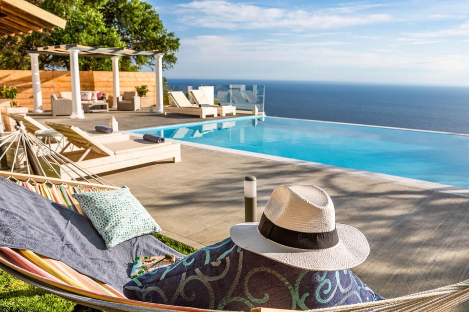 Lounge or bar, Seating area, Sea view, Swimming pool, Sunset