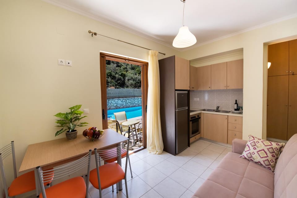 Kitchen or kitchenette, Seating area, Pool view