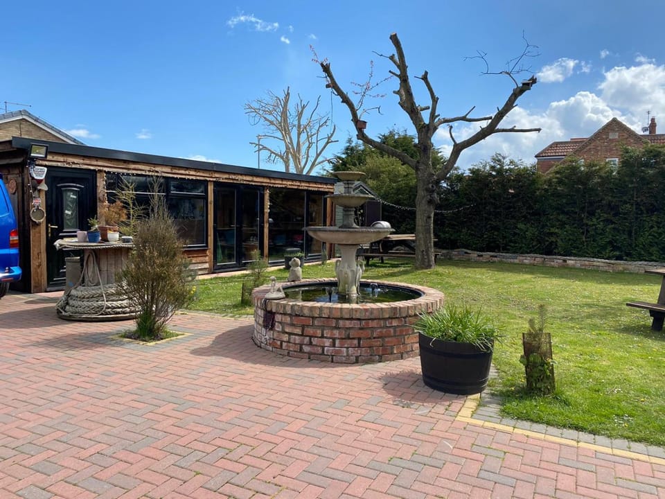 Property building, Patio, BBQ facilities, Garden