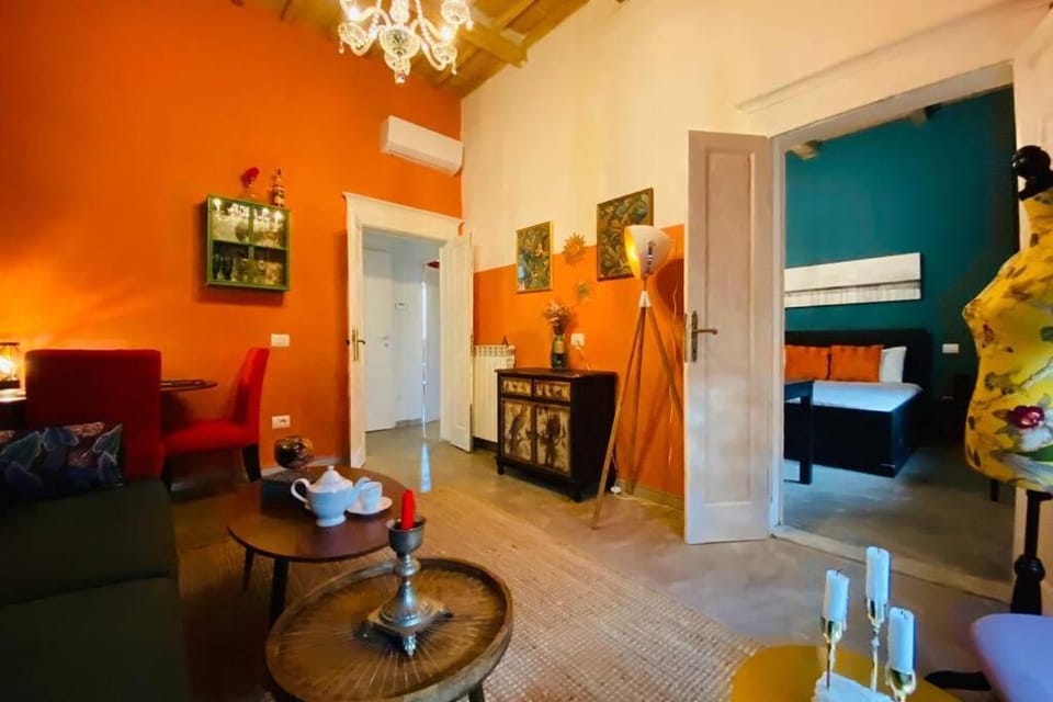 Bed, Living room, Seating area, Bedroom