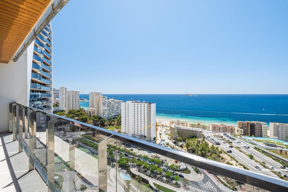 Property building, Nearby landmark, Day, Natural landscape, View (from property/room), Balcony/Terrace, Beach, City view, Sea view