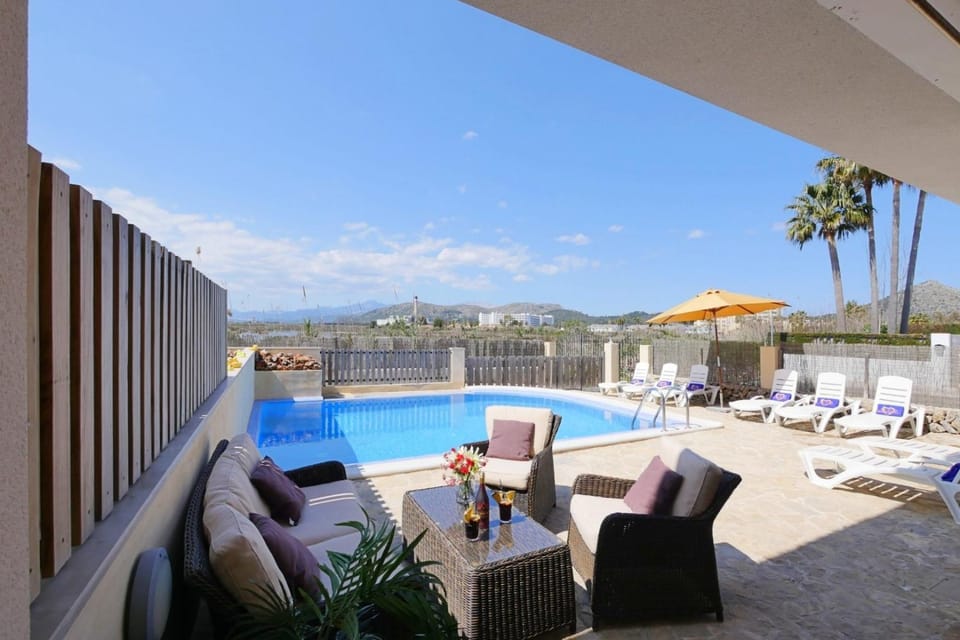 Property building, Living room, Swimming pool