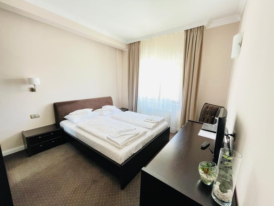 Bed, Photo of the whole room, Bedroom, hair dresser, towels
