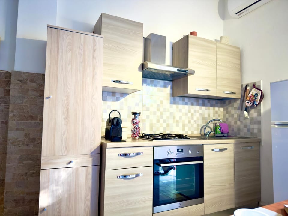 Kitchen or kitchenette, oven, stove
