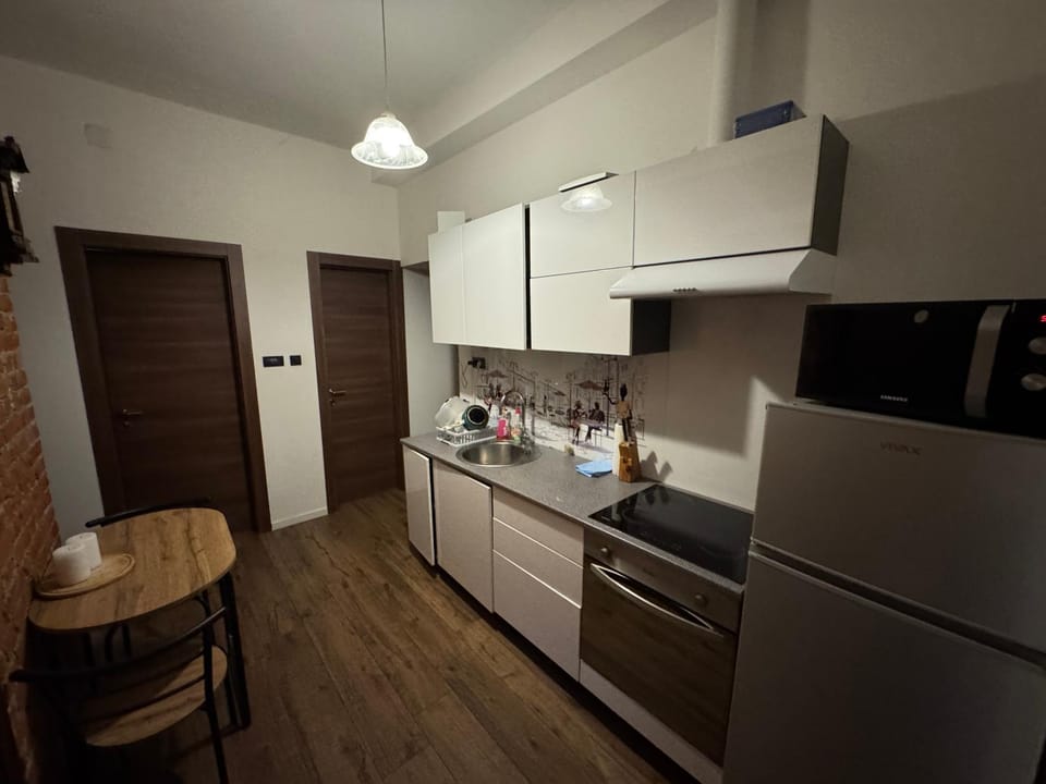 Kitchen or kitchenette, oven
