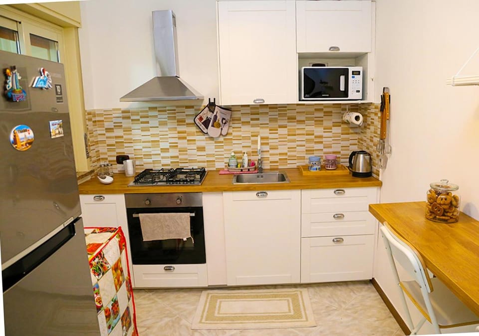 Kitchen or kitchenette, oven, stove