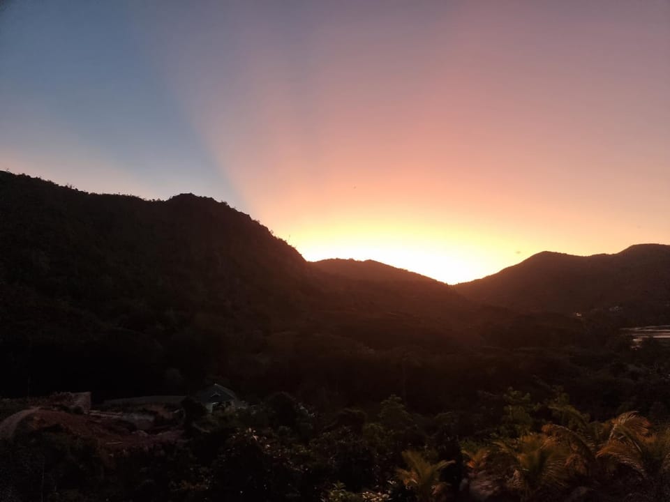Property building, Nearby landmark, Natural landscape, Mountain view, Sea view, Sunset
