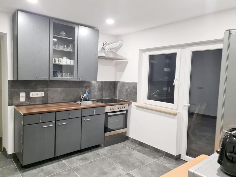 Kitchen or kitchenette, stove