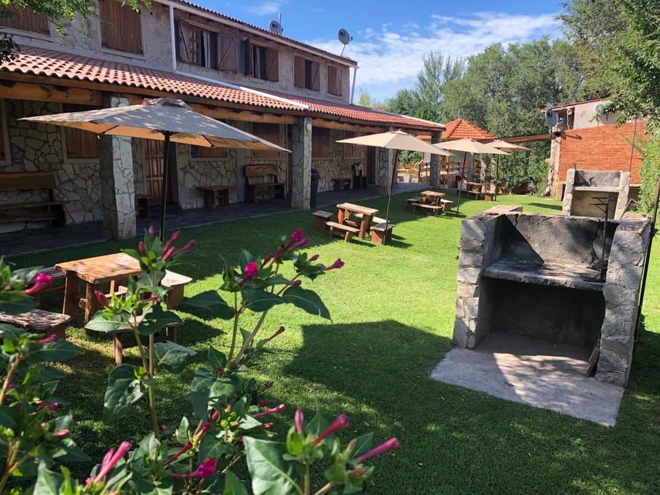 Property building, Patio, Off site, Day, Natural landscape, BBQ facilities, Garden, View (from property/room), Dining area, Garden view, Area and facilities, Inner courtyard view, locker, sunbed