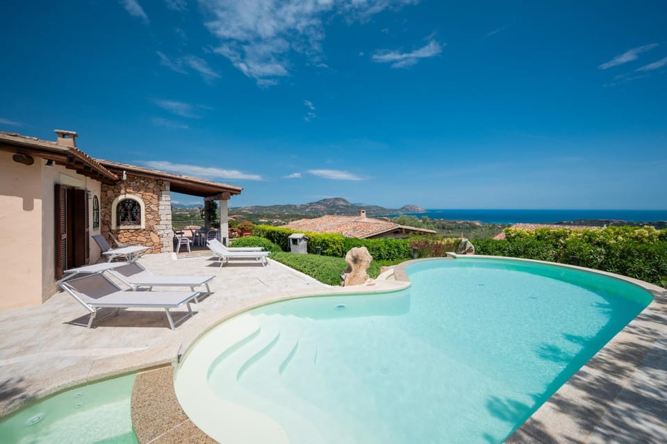 Property building, Patio, Natural landscape, Pool view, Swimming pool, sunbed