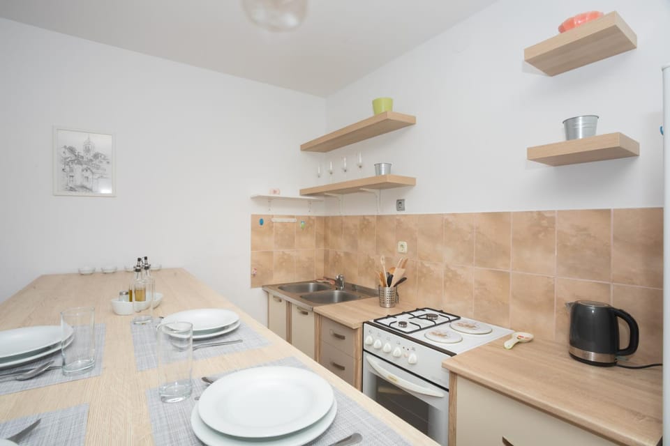 Kitchen or kitchenette, oven, stove