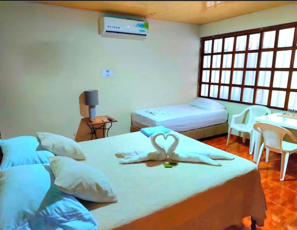 Bed, Photo of the whole room, Seating area, Bedroom, air conditioner