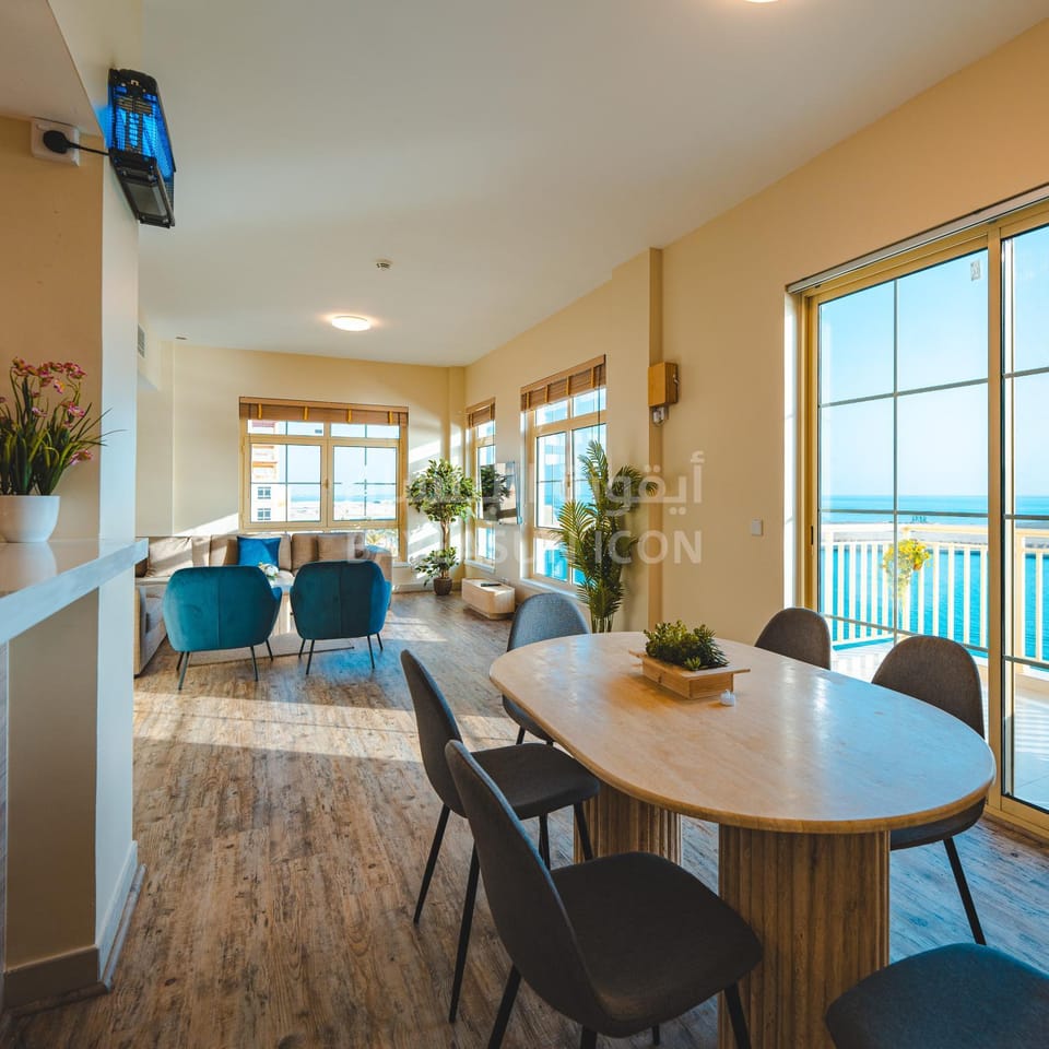 Natural landscape, Living room, Seating area, Dining area, Sea view