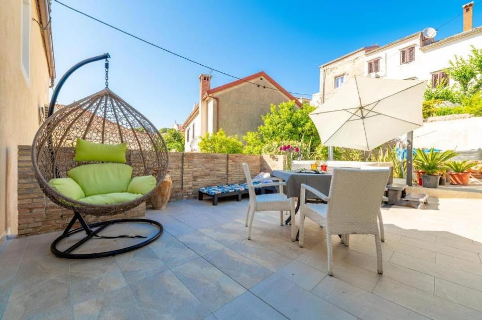 Patio, Day, Balcony/Terrace, Seating area, sunbed