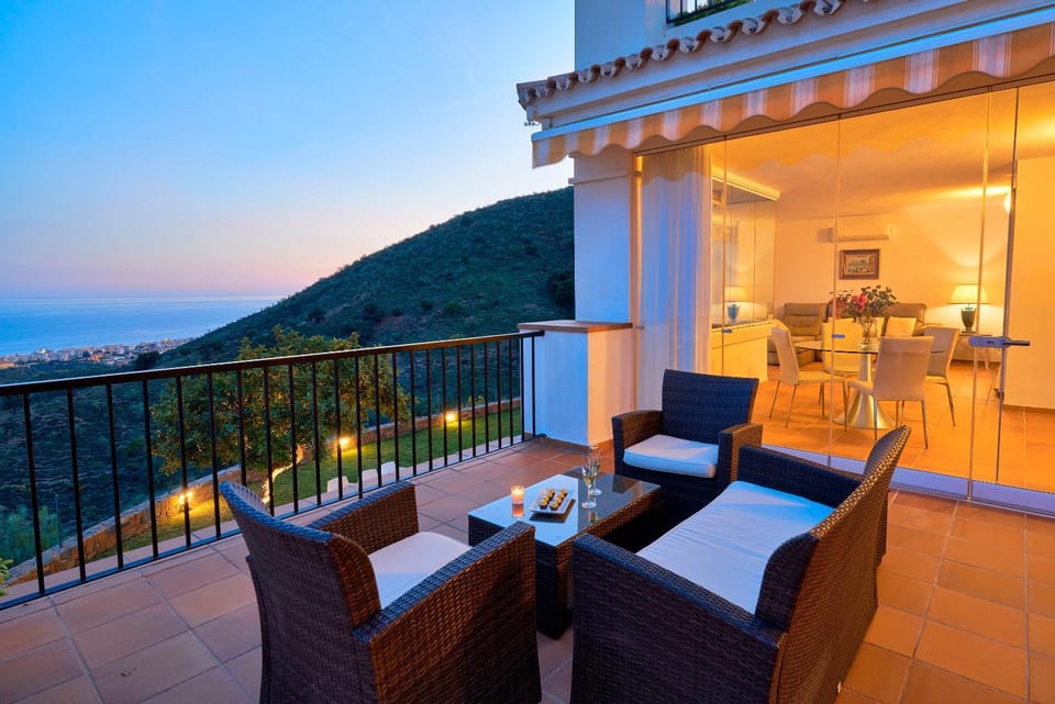 Patio, Natural landscape, View (from property/room), Balcony/Terrace, Living room, Seating area, Dining area, Mountain view, Sea view, Sunset