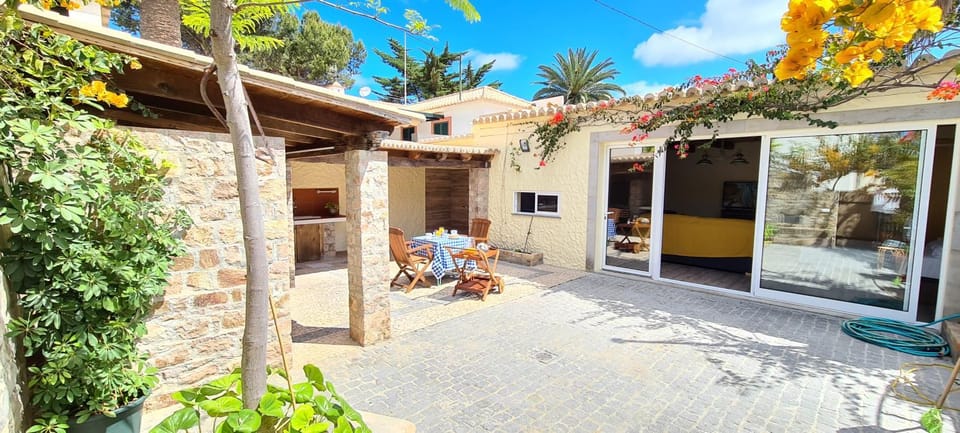 Property building, Patio, Facade/entrance, Seating area