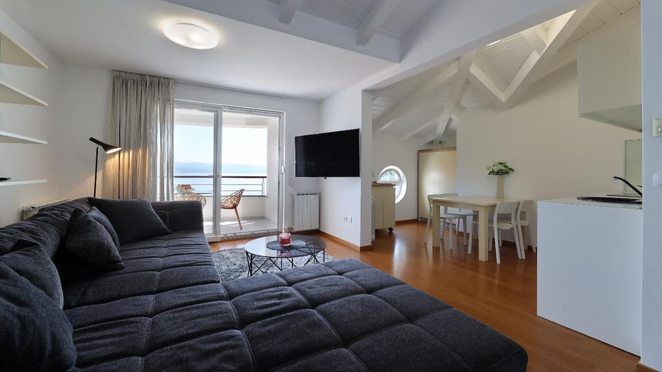 Kitchen or kitchenette, Living room, Seating area, Dining area, Sea view