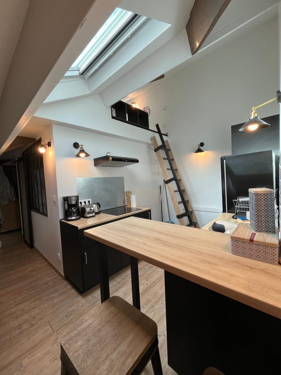 Kitchen or kitchenette, dishwasher, oven, stove, toaster