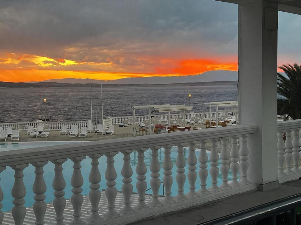View (from property/room), Balcony/Terrace, Pool view, Sea view, Sunset
