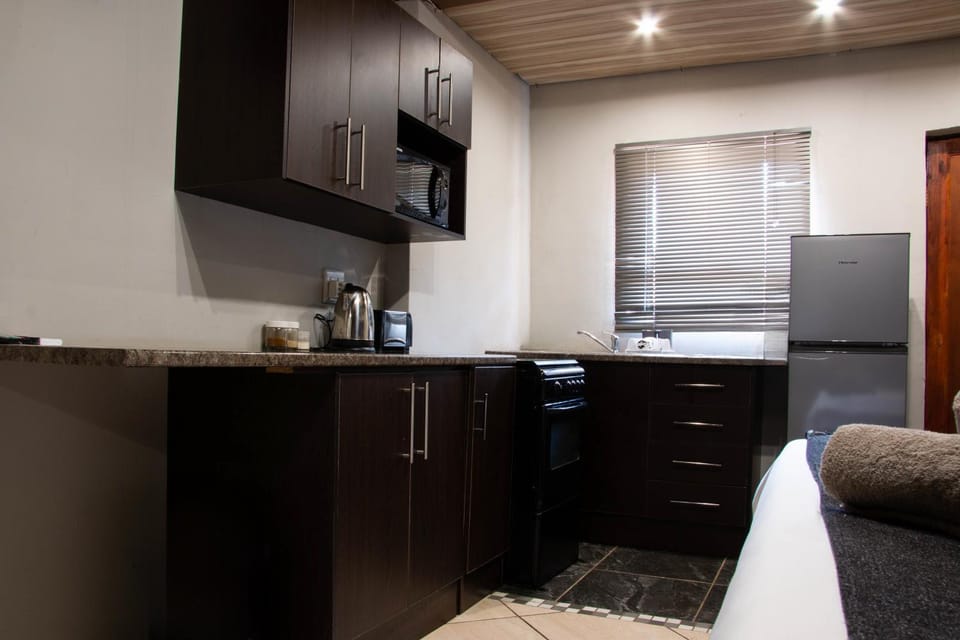 Kitchen or kitchenette, oven, stove