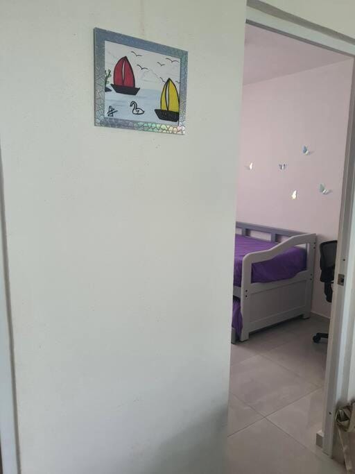 Departamento en planta baja, frente a la alberca y terraza, aire acondicionado total y WIFI Apartment in Manzanillo