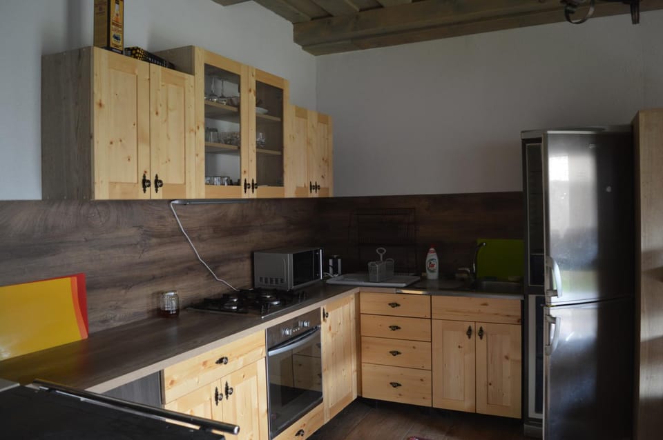 Kitchen or kitchenette, oven, stove