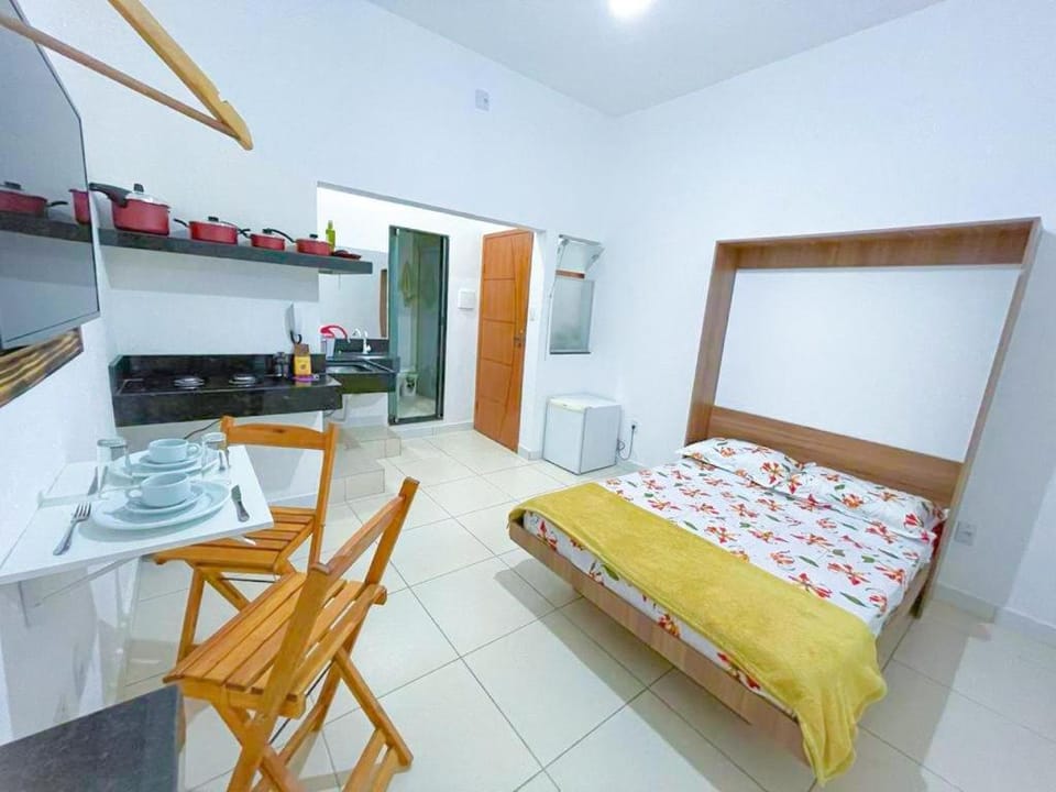 Suíte aconchegante no Centro de Caratinga - kitnet Apartment in State of Minas Gerais, Brazil