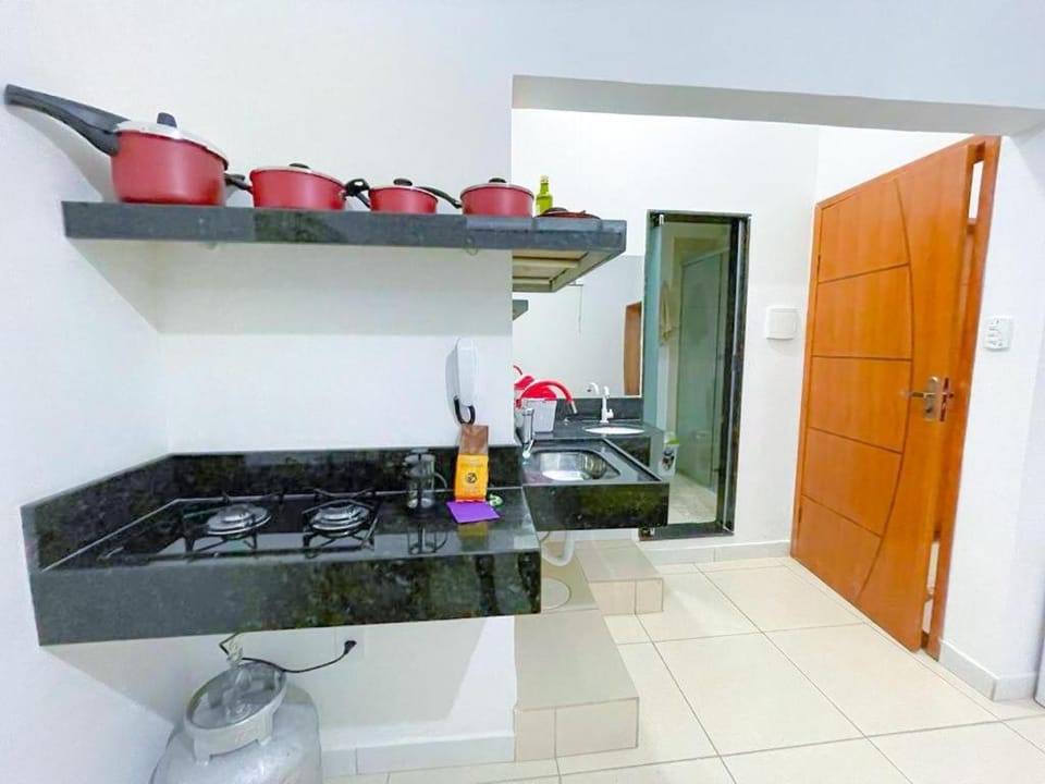 Suíte aconchegante no Centro de Caratinga - kitnet Apartment in State of Minas Gerais, Brazil