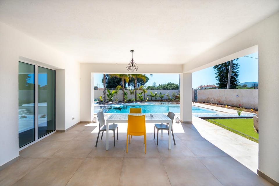 Patio, Garden, Living room, Dining area, Garden view, Pool view