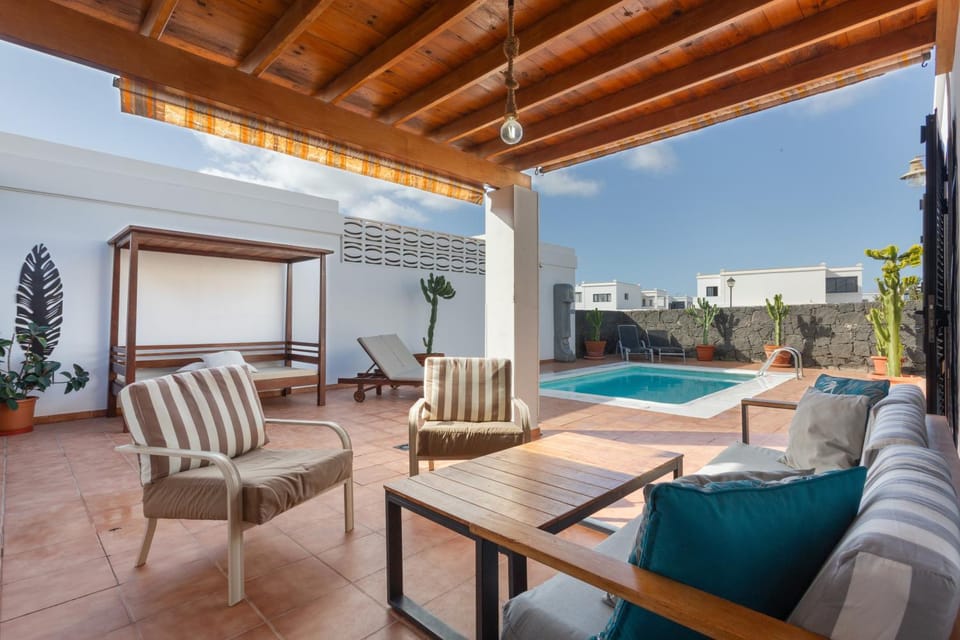 Property building, Living room, Swimming pool