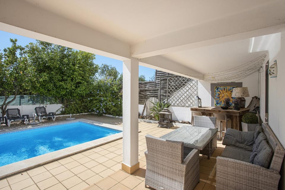 Property building, Living room, Swimming pool