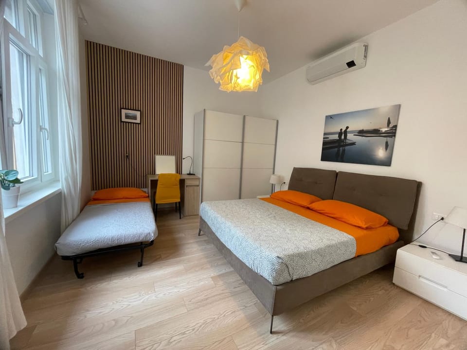Bed, Bedroom, City view, locker, air conditioner