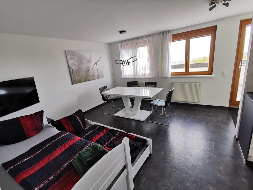 Facade/entrance, Bed, View (from property/room), Dining area, City view